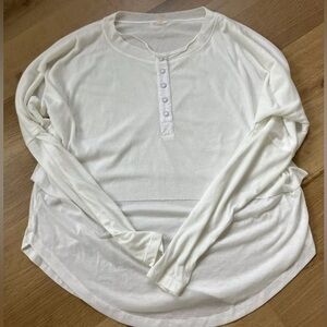 White long sleeved shirt from free people.